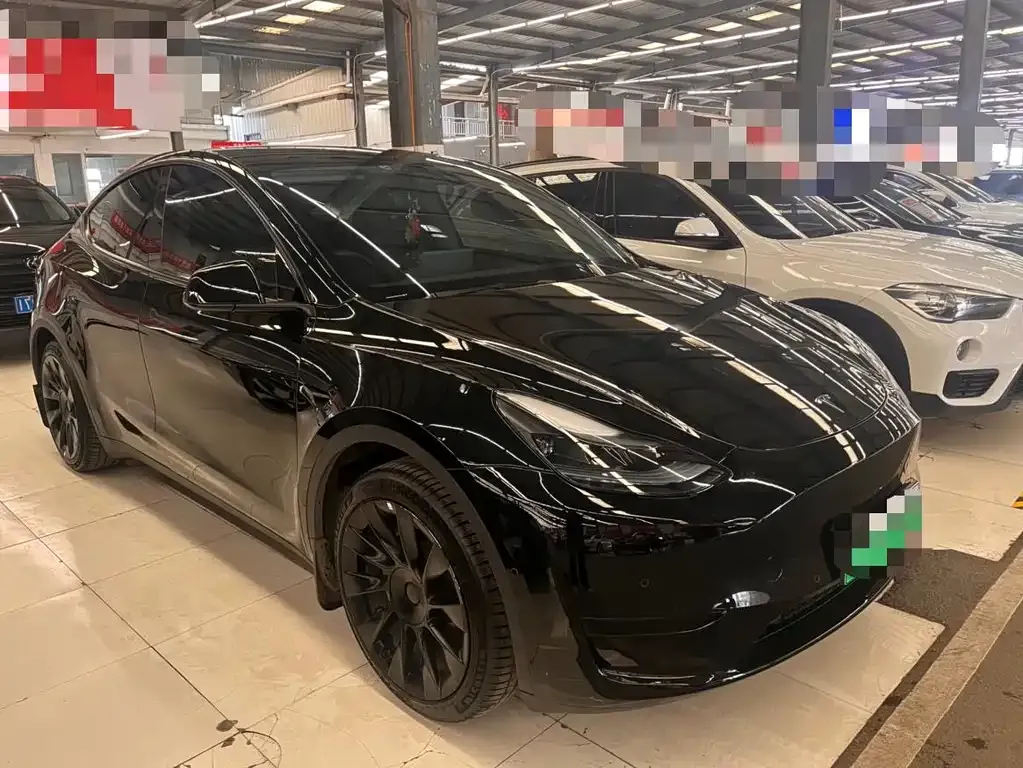 Tesla Model Y — фото 7