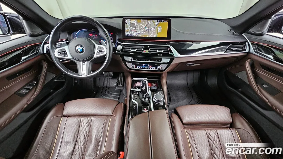 BMW 5-Series — фото 10