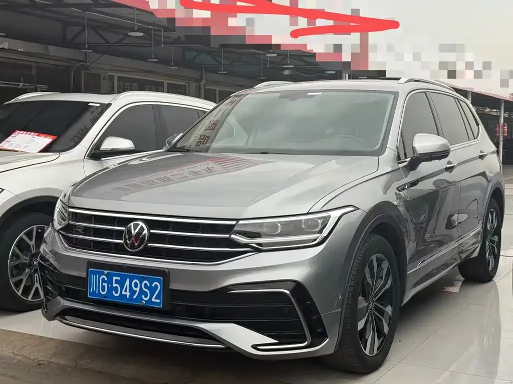 Volkswagen Tiguan L — фото 1