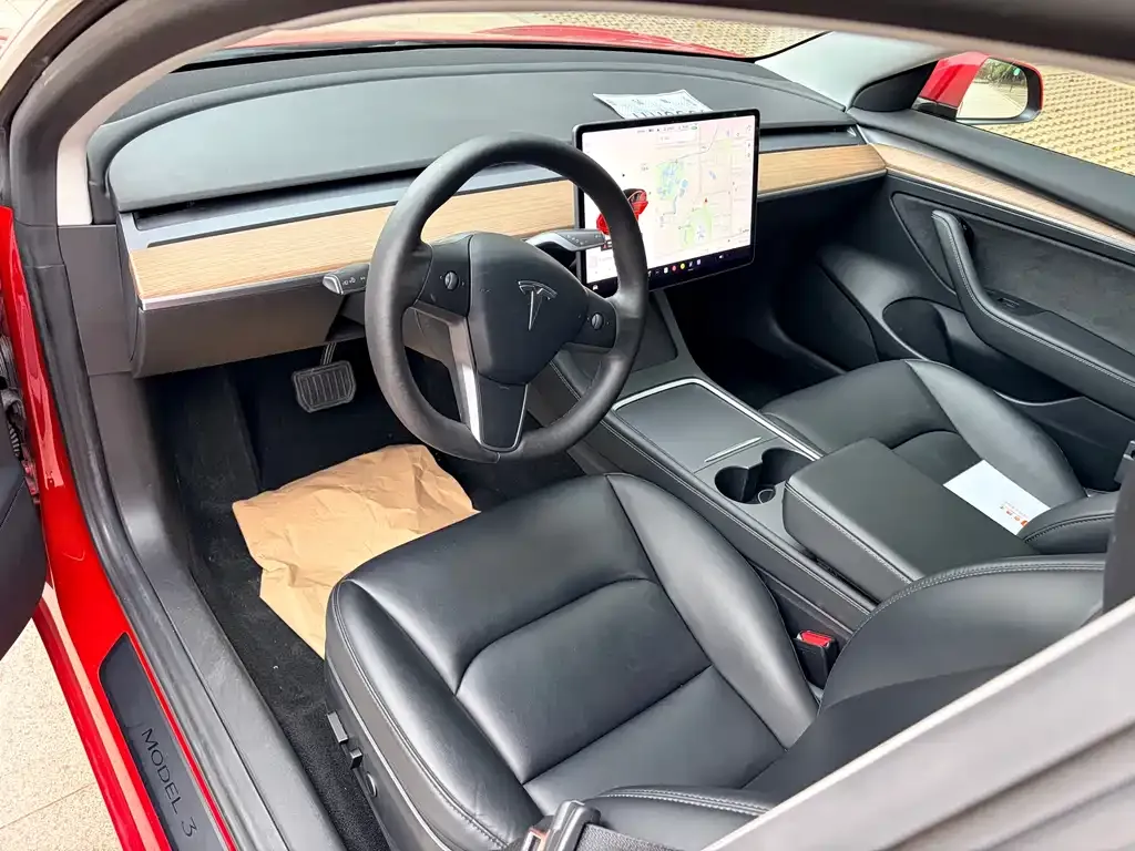 Tesla Model 3 — фото 7