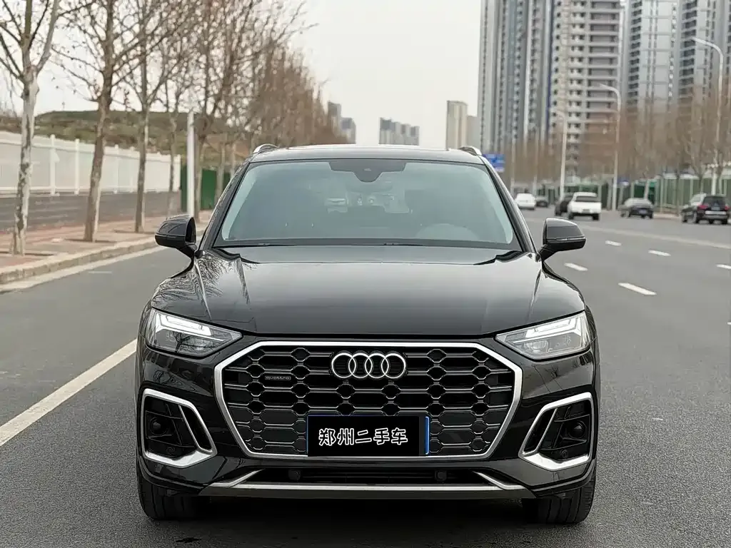 Audi Q5L — фото 5