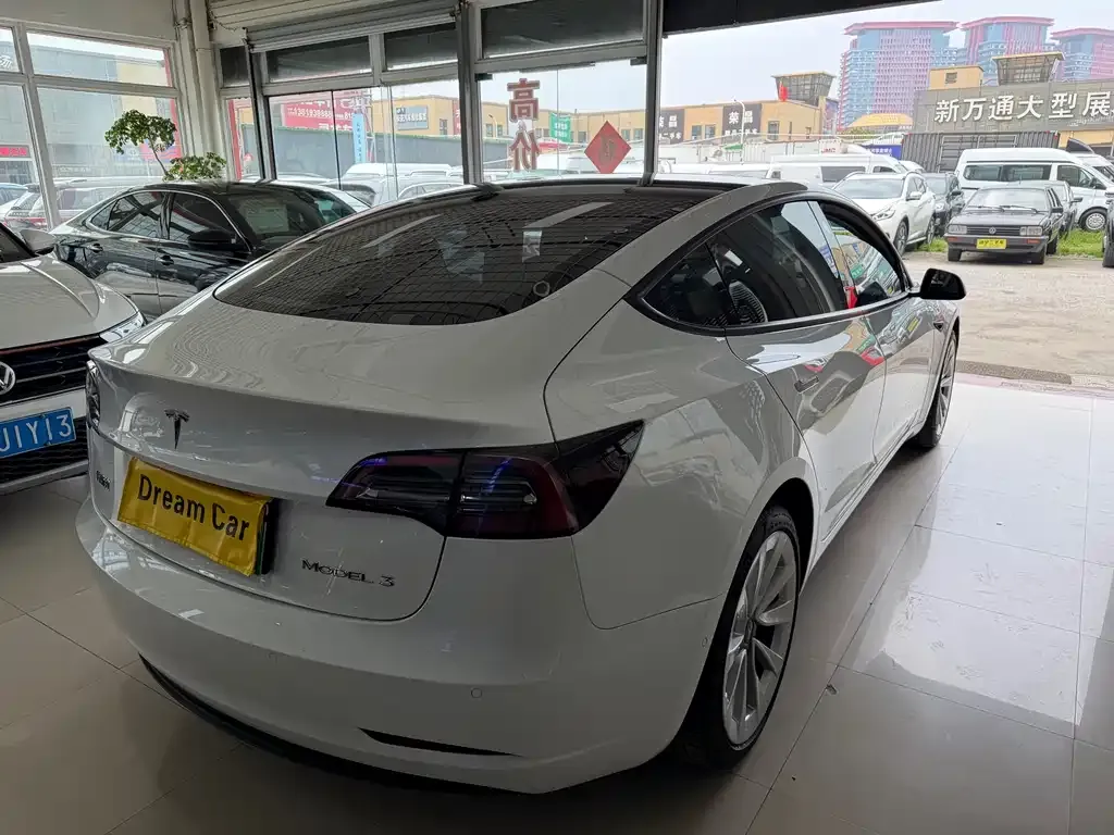 Tesla Model 3 — фото 10