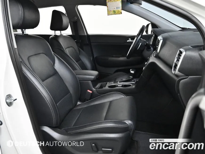 Kia Sportage — фото 8