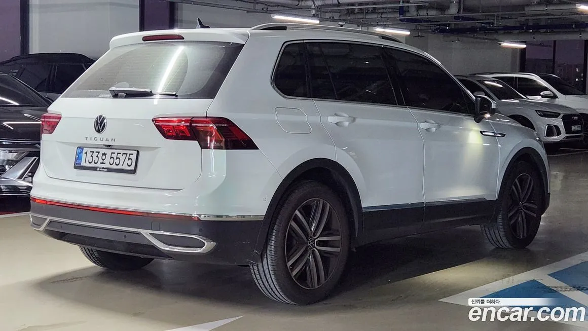 Volkswagen Tiguan — фото 10