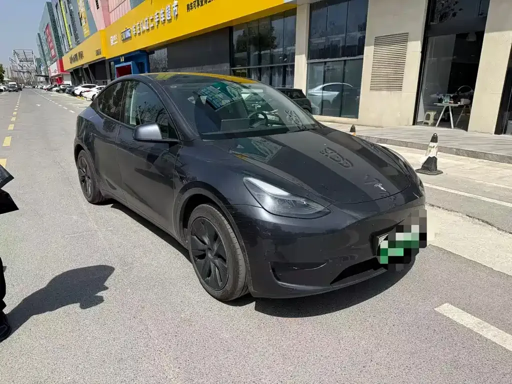 Tesla Model Y — фото 7