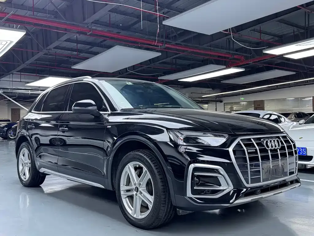 Audi Q5L — фото 10
