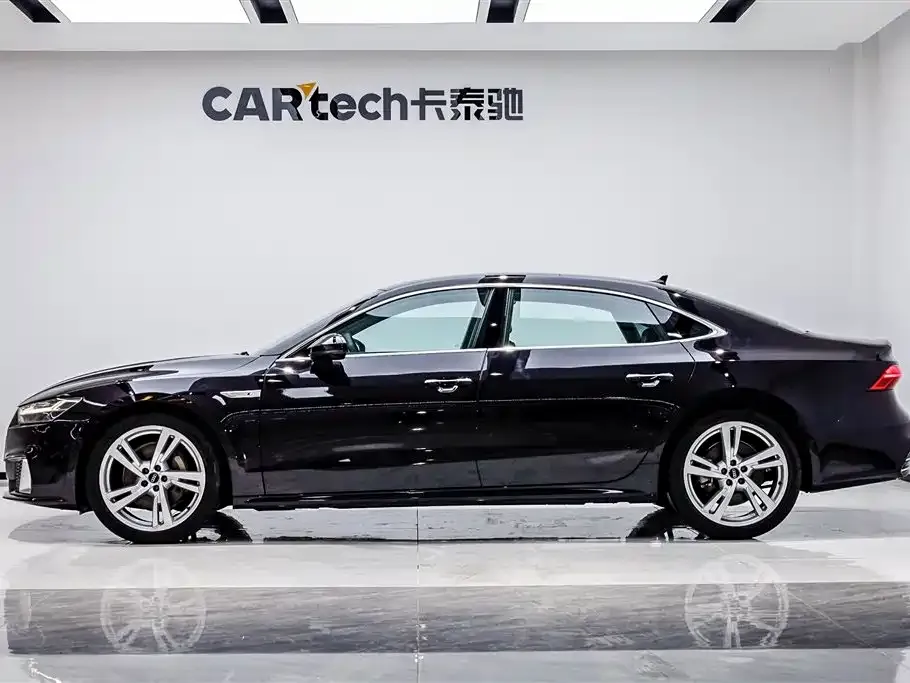 Audi A7L — фото 8