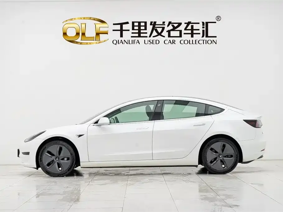 Tesla Model 3 — фото 8
