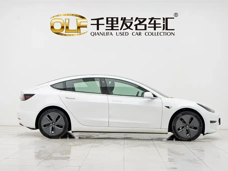 Tesla Model 3 — фото 7