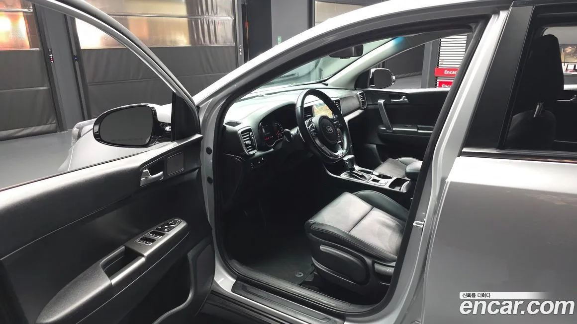 Kia Sportage — фото 10
