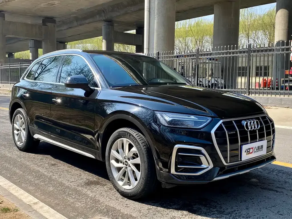 Audi Q5L — фото 6