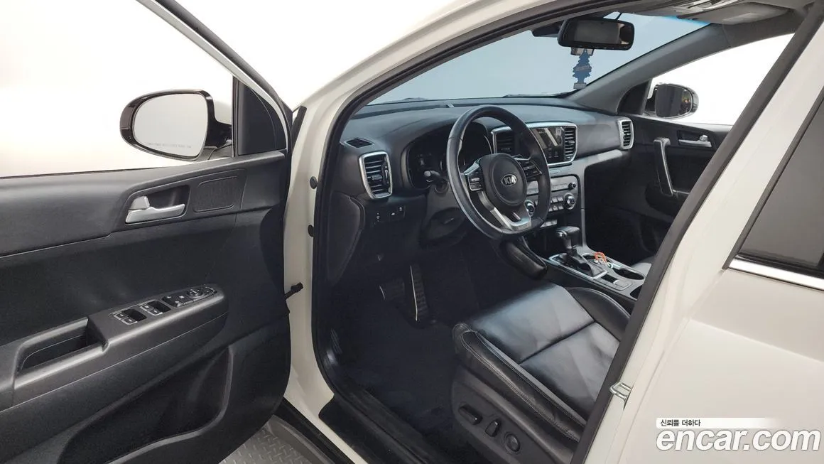 Kia Sportage — фото 9