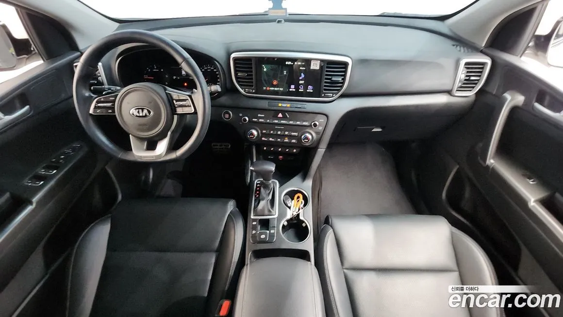 Kia Sportage — фото 7