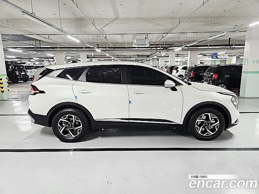 Kia Sportage — фото 7