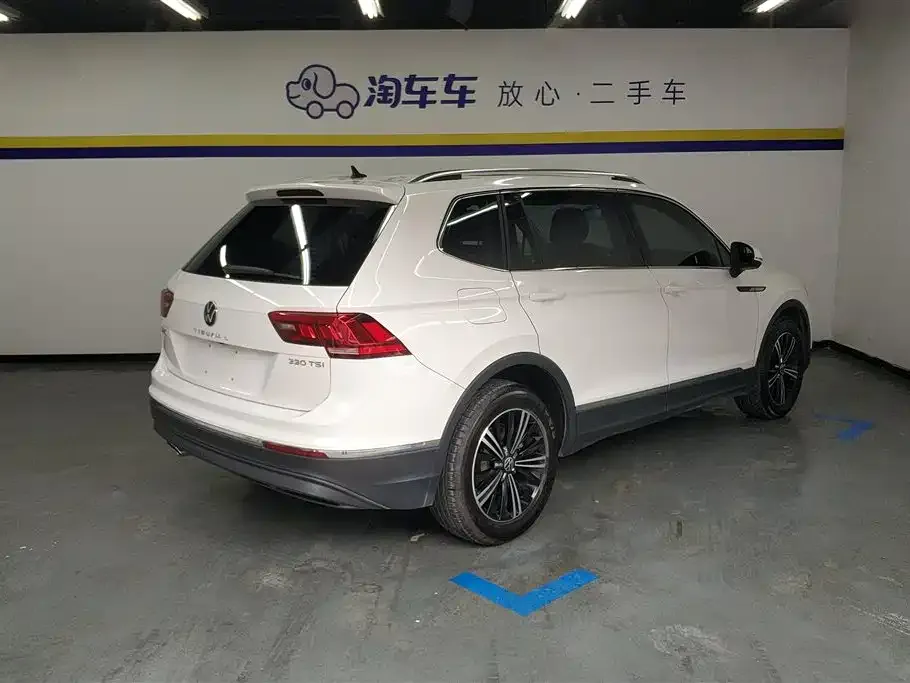 Volkswagen Tiguan L — фото 7