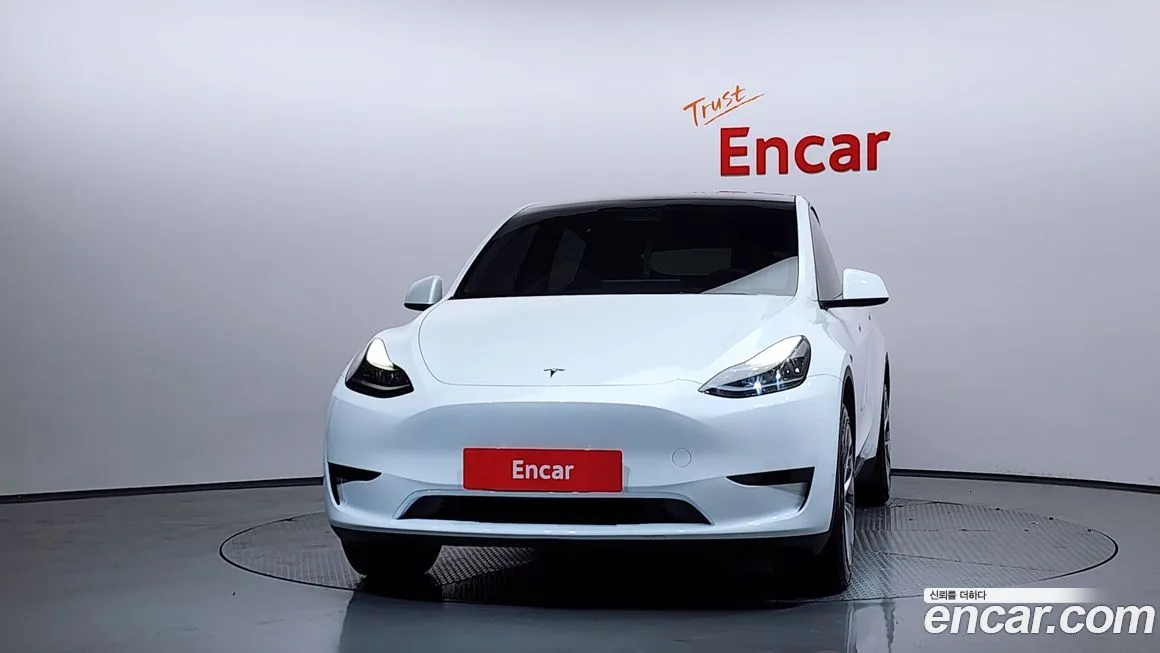 Tesla Model Y — фото 10