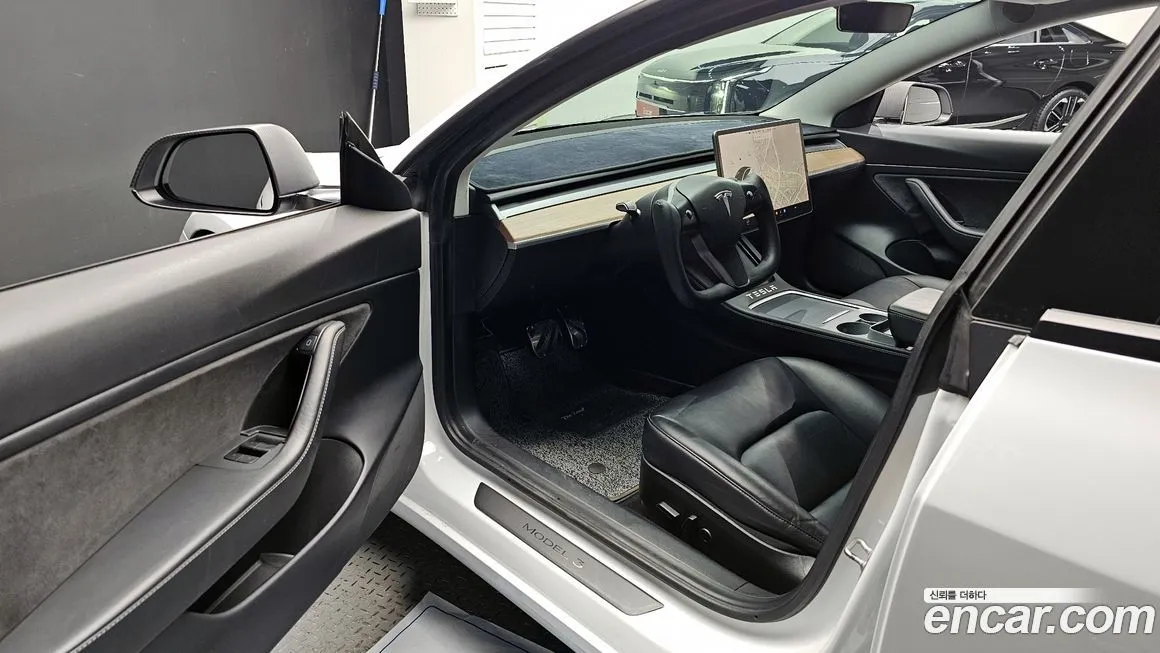 Tesla Model 3 — фото 10