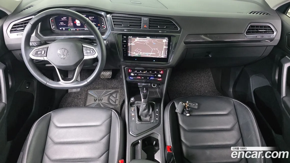 Volkswagen Tiguan — фото 10