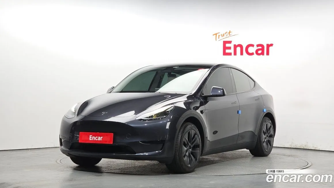 Tesla Model Y — фото 1