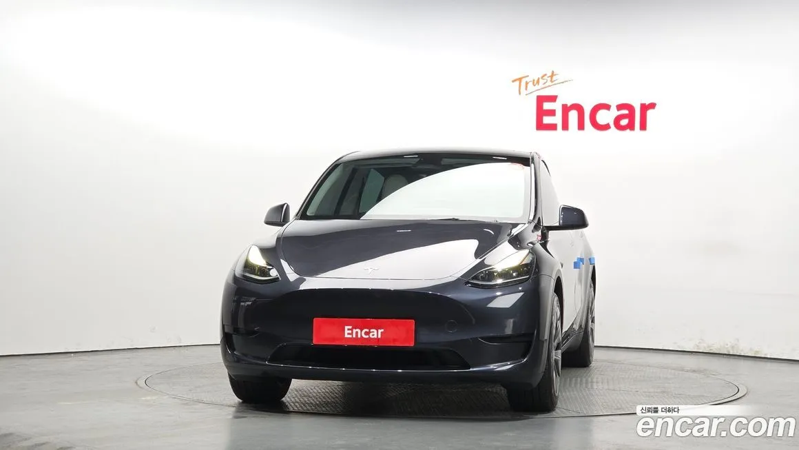 Tesla Model Y — фото 10