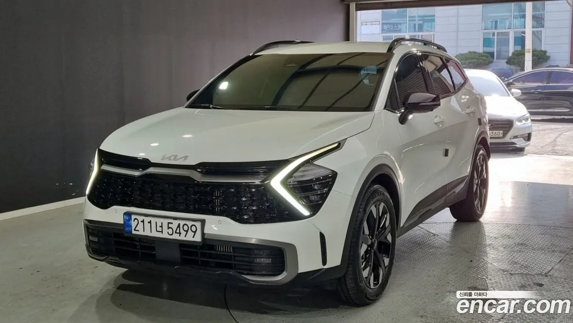 Kia Sportage — фото 1