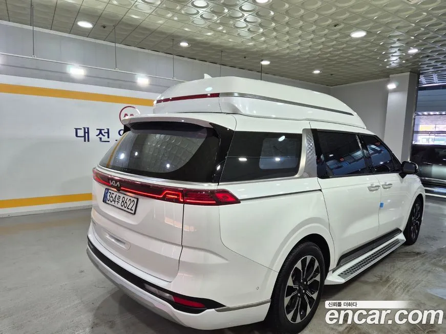 Kia Carnival — фото 10