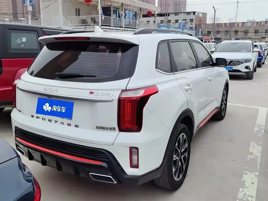 Kia Sportage — фото 10