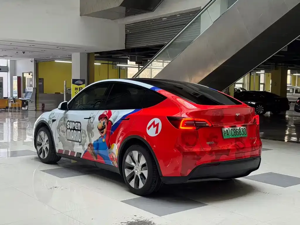 Tesla Model Y — фото 10