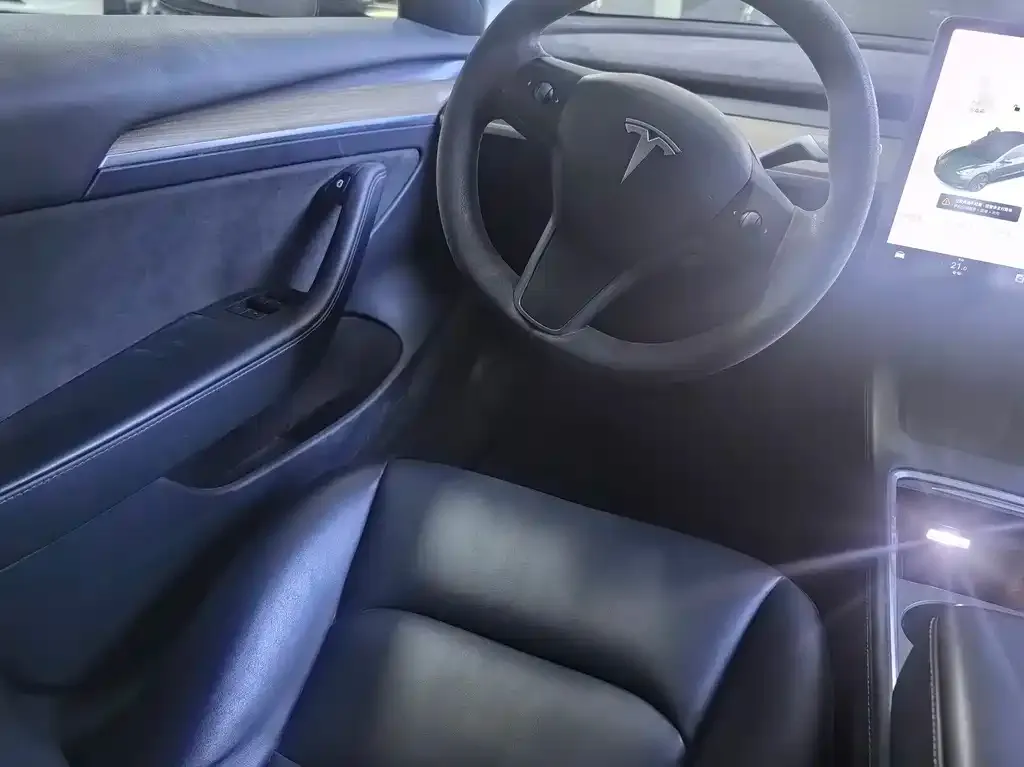 Tesla Model 3 — фото 7