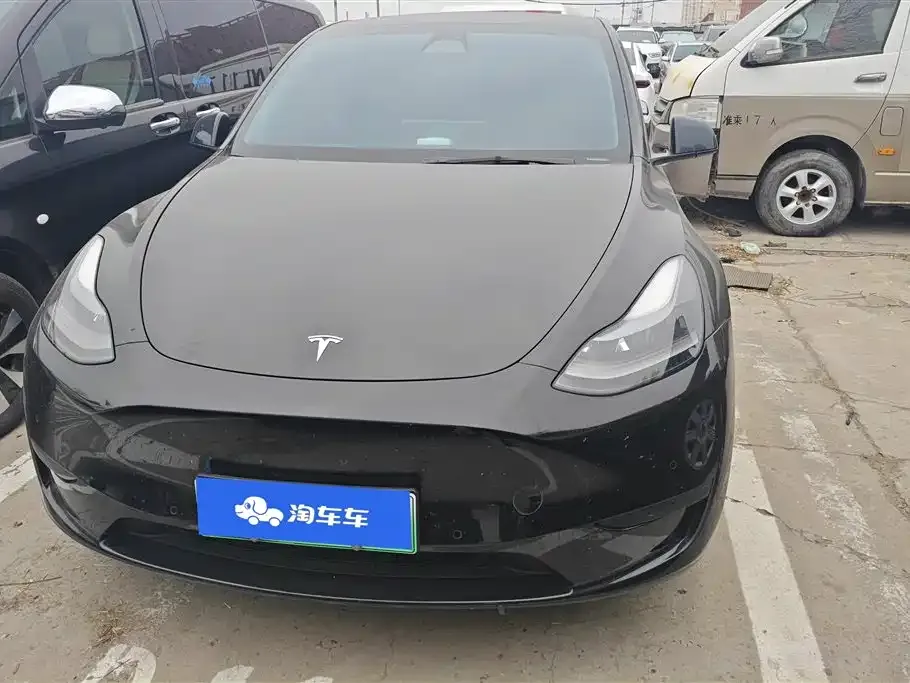 Tesla Model Y — фото 10
