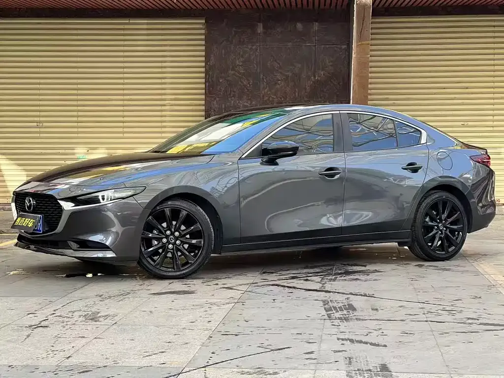 Mazda 3 Axela — фото 1