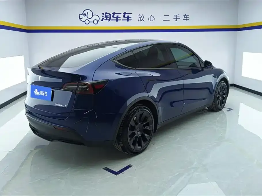 Tesla Model Y — фото 8