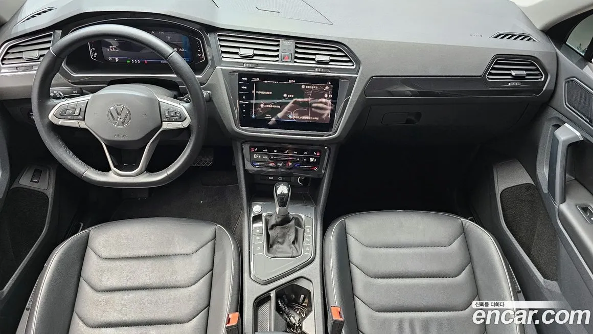 Volkswagen Tiguan — фото 10