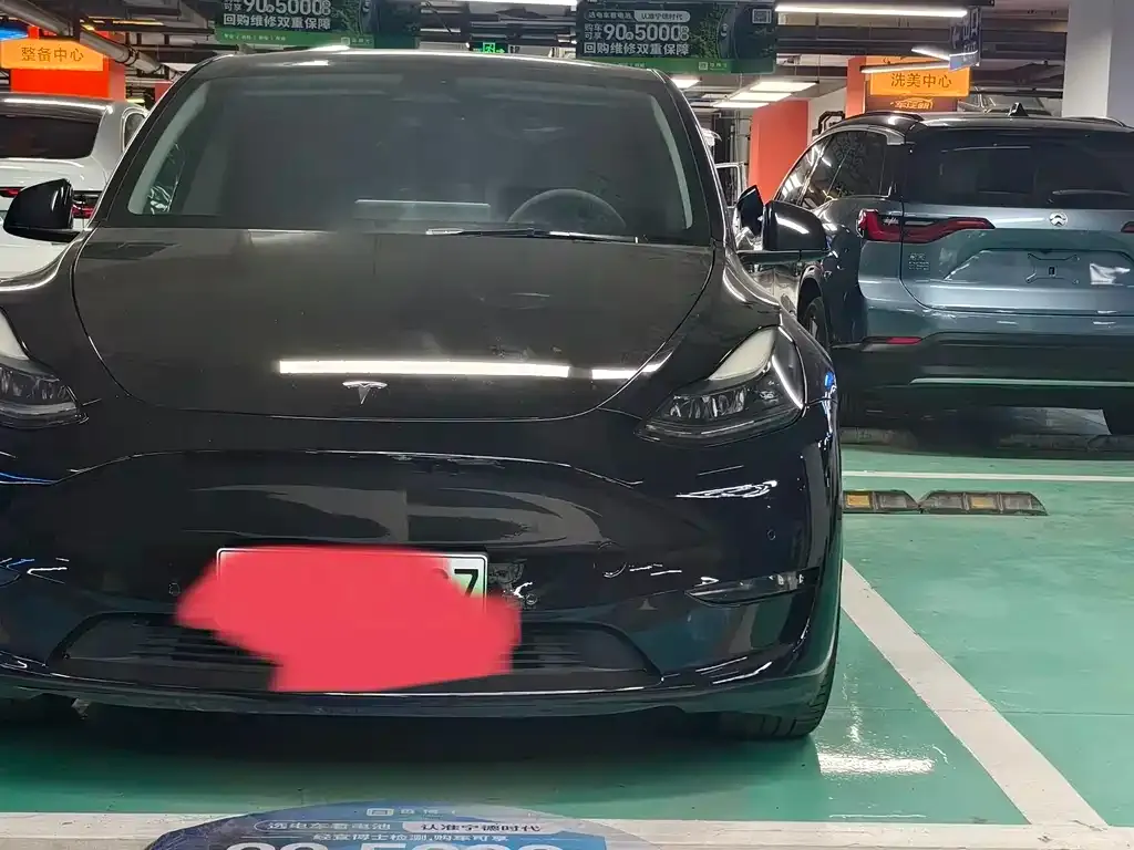 Tesla Model Y — фото 10