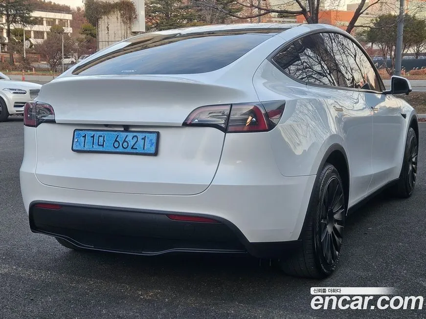 Tesla Model Y — фото 7