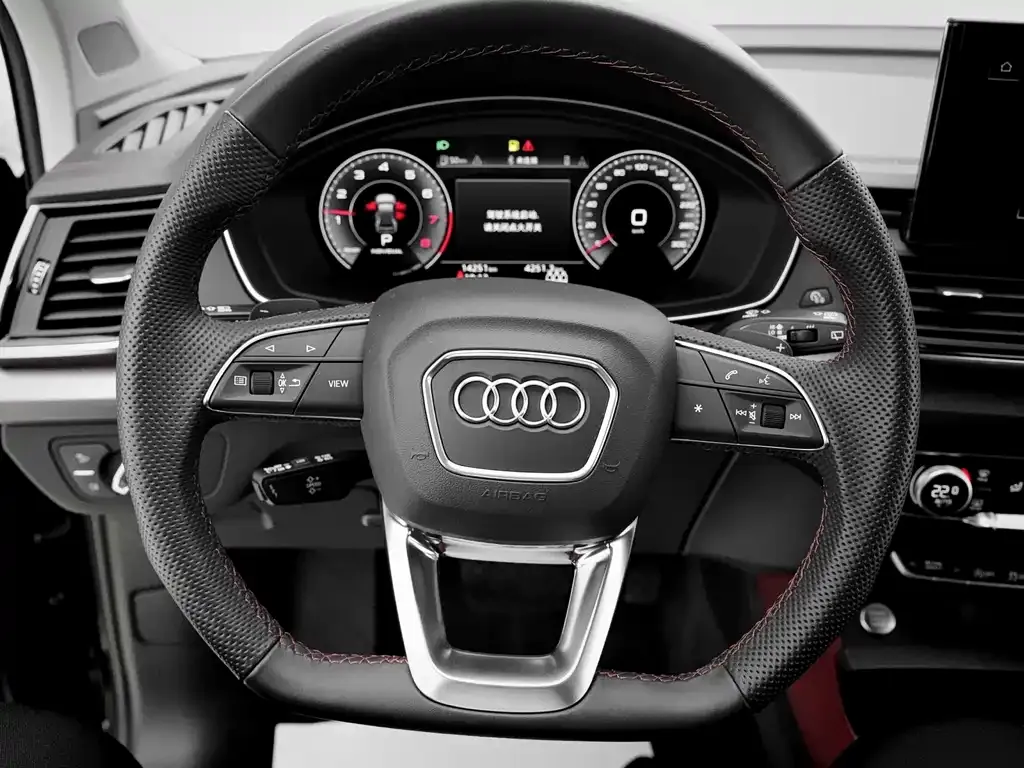 Audi Q5L — фото 10