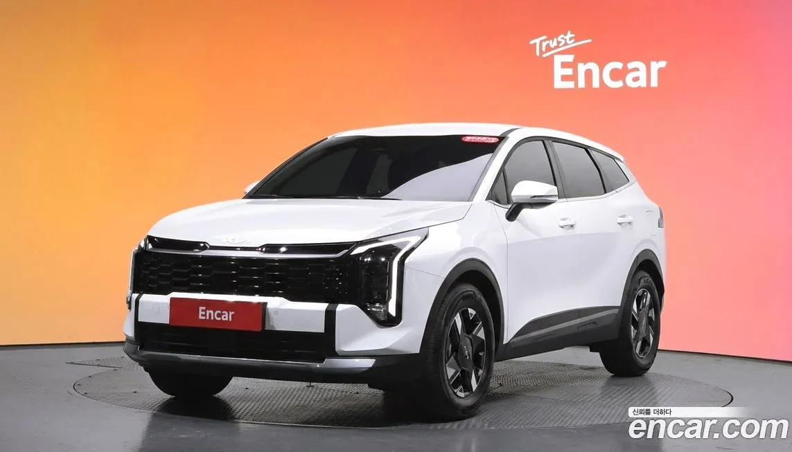 Kia Sportage — фото 1