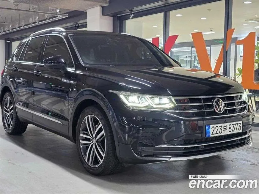 Volkswagen Tiguan — фото 1