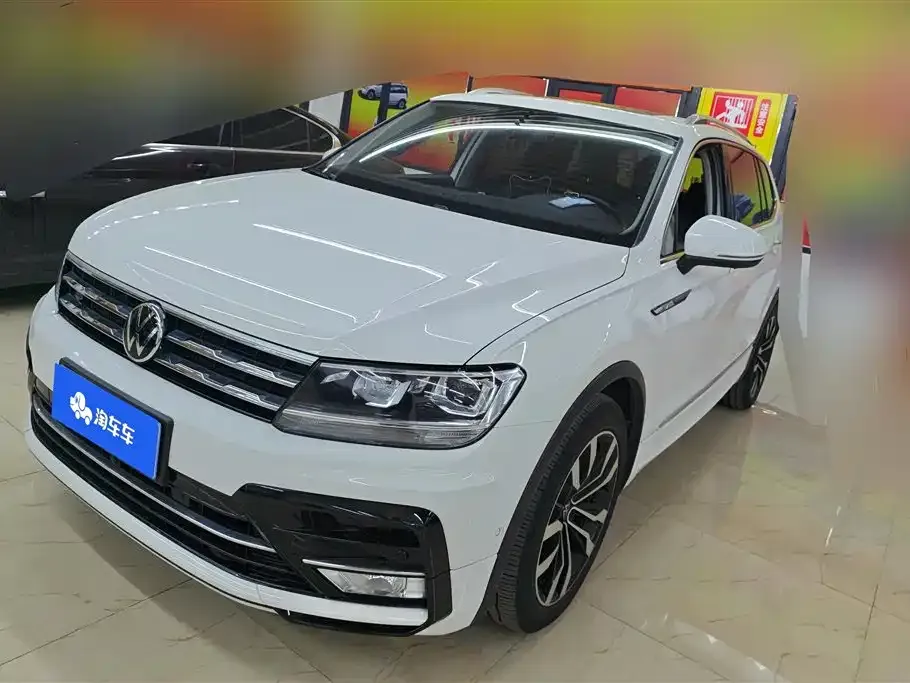 Volkswagen Tiguan L New Energy — фото 1