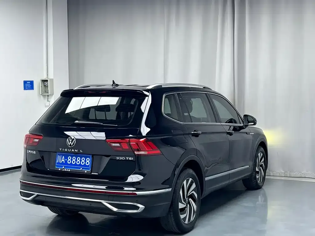 Volkswagen Tiguan L — фото 3