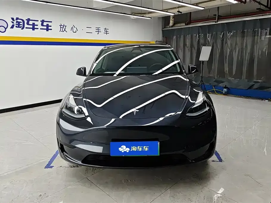 Tesla Model Y — фото 10