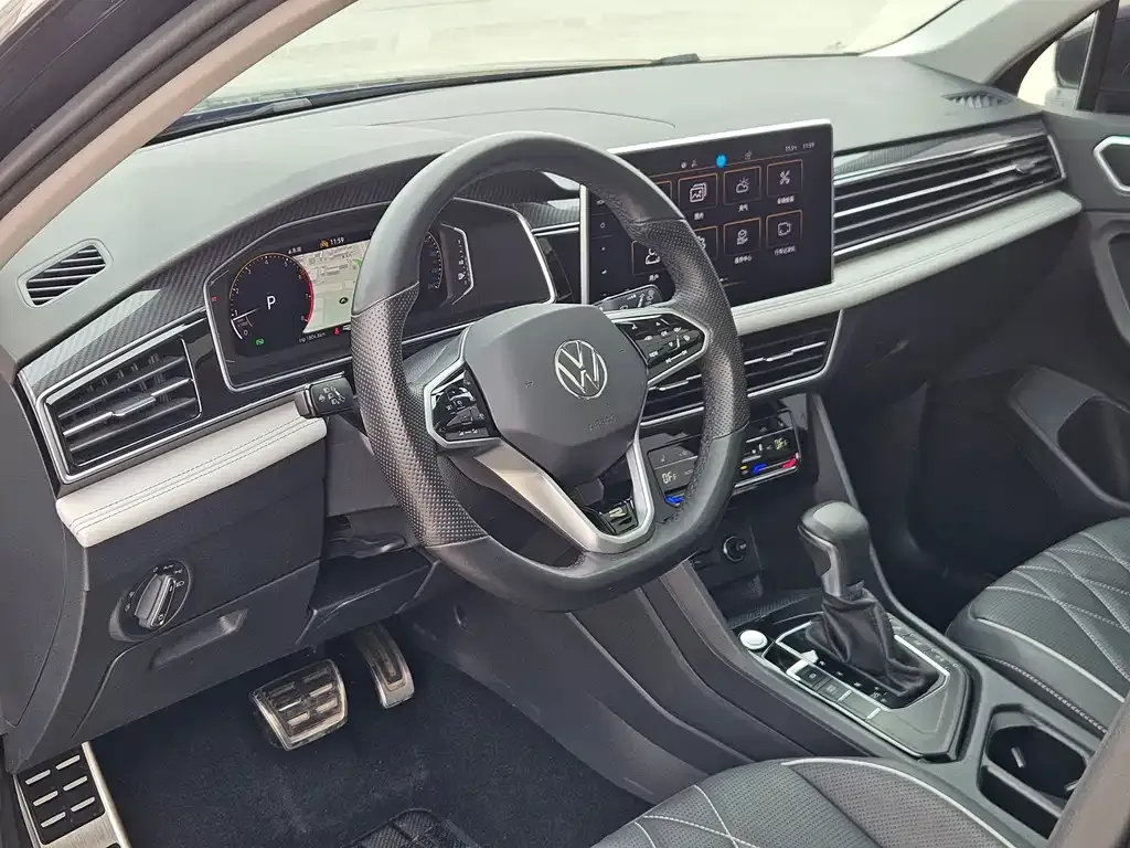Volkswagen Tiguan L — фото 7