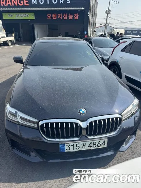 BMW 5-Series — фото 1