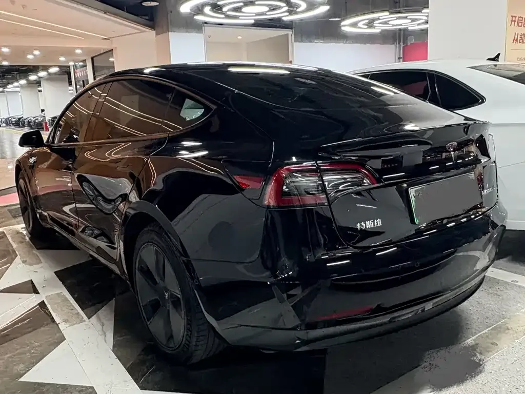 Tesla Model 3 — фото 8