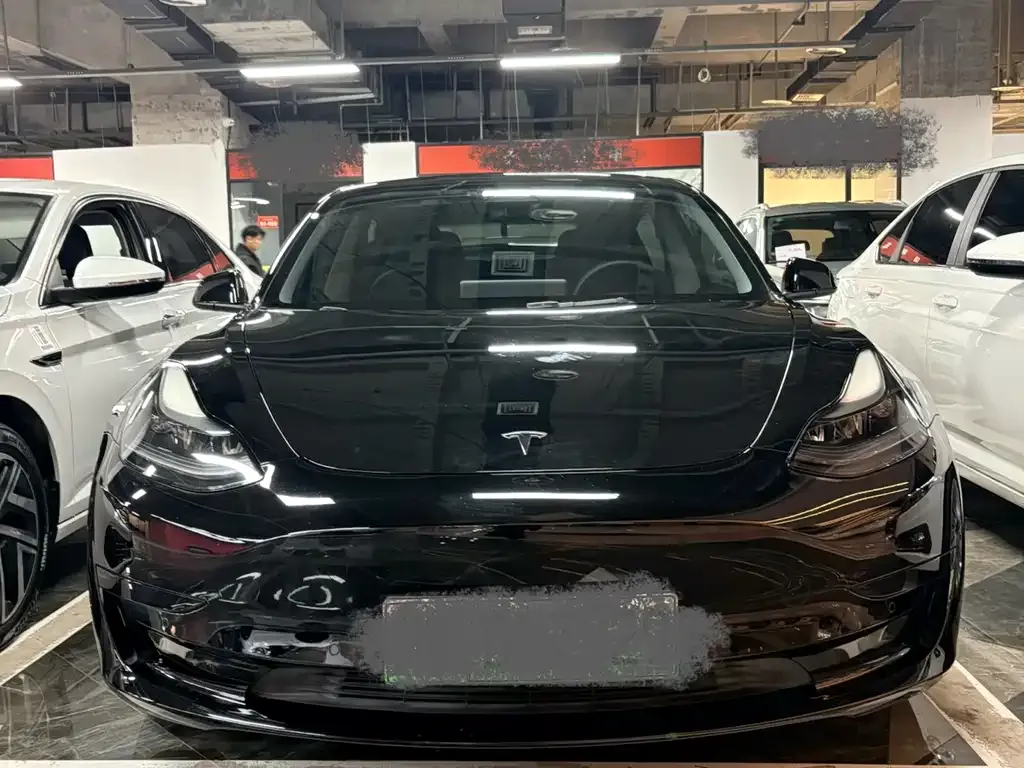 Tesla Model 3 — фото 10