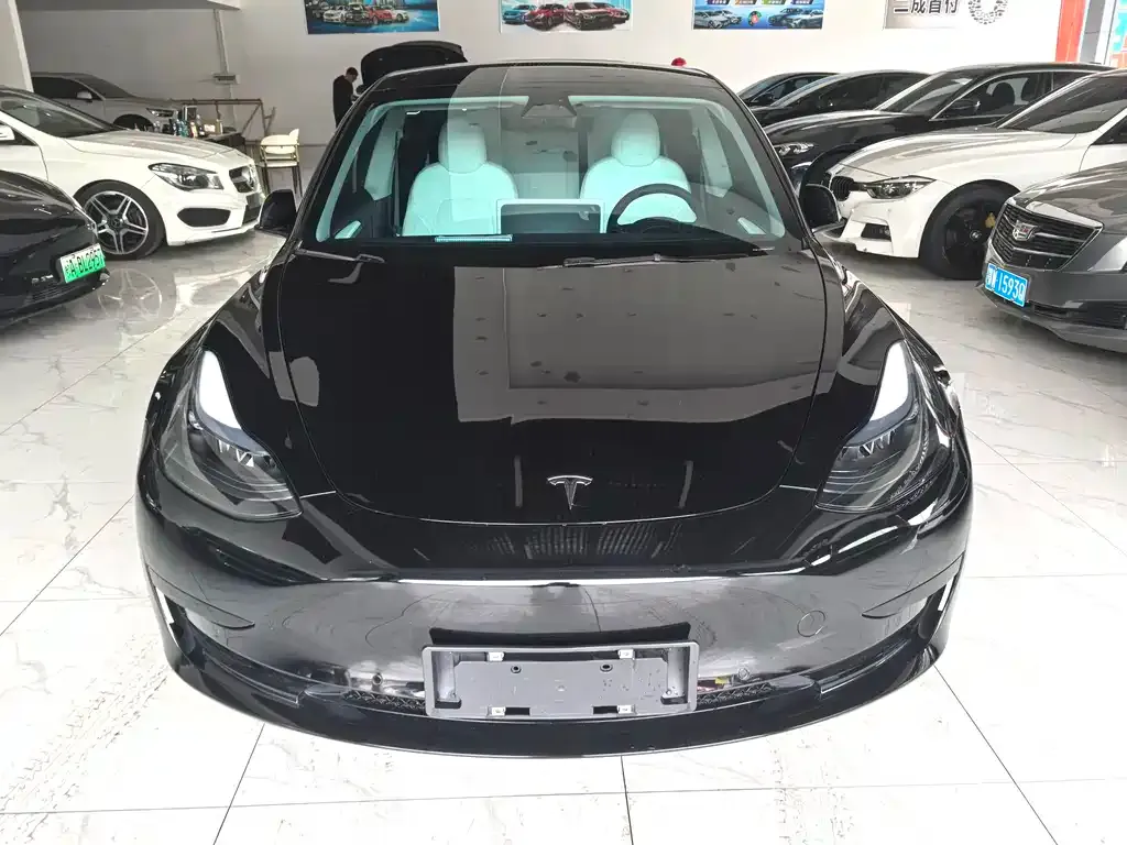 Tesla Model 3 — фото 7