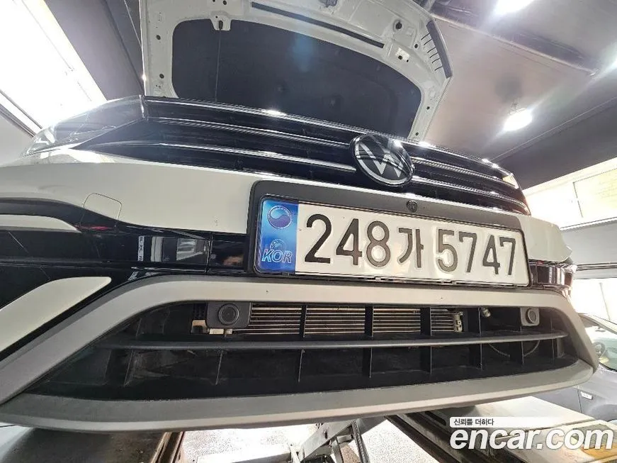 Volkswagen Tiguan — фото 1