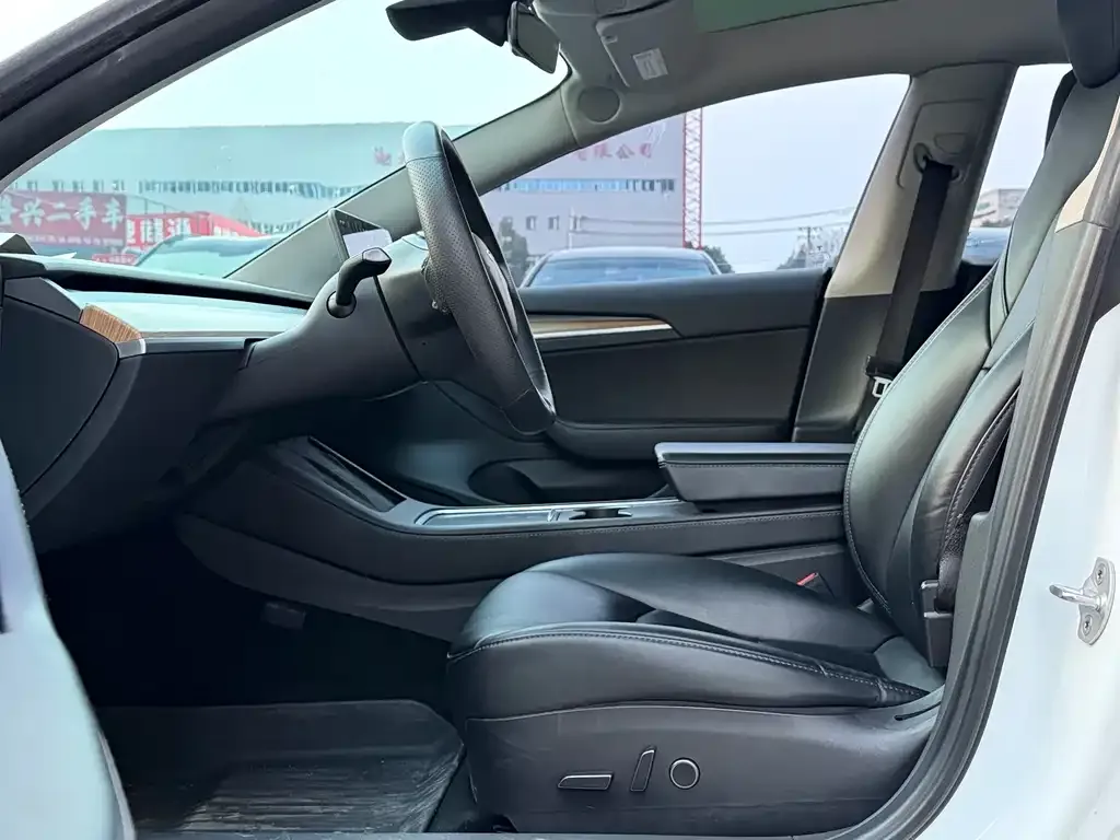Tesla Model 3 — фото 6