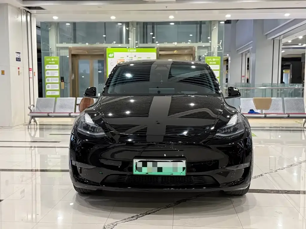 Tesla Model Y — фото 9