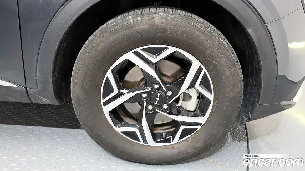 Kia Sportage — фото 9